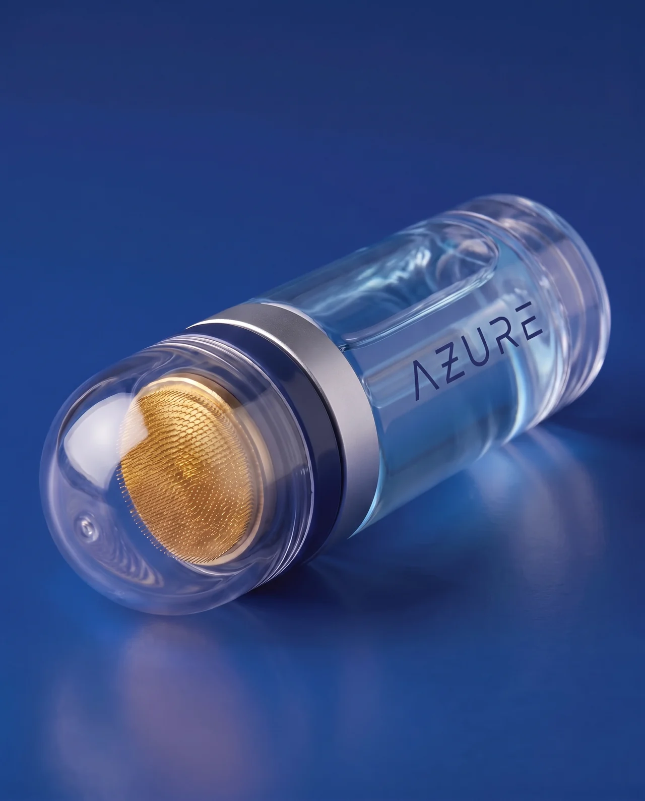 Macro of the AZURE applicator's gold-plated 0.5 mm micro-needle pad under its clear dome